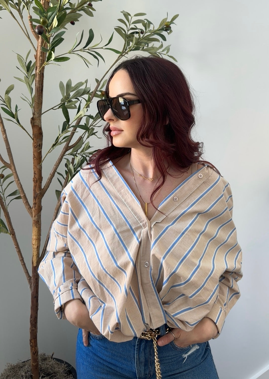 Striped twist button down top